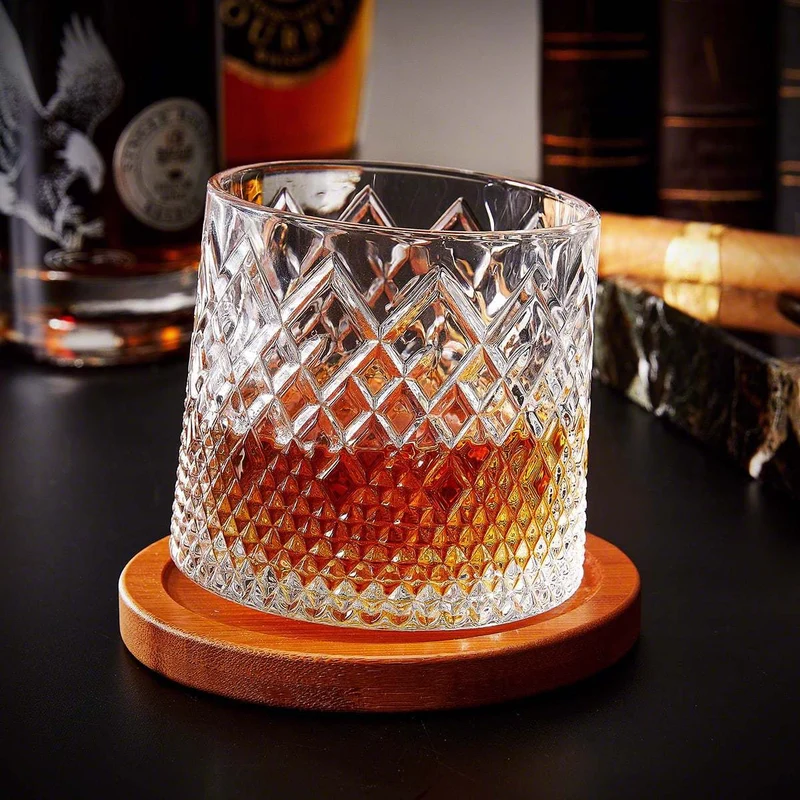 Spinning Whiskey Glass with Diamond Cut Pattern and Wooden Coaster Base