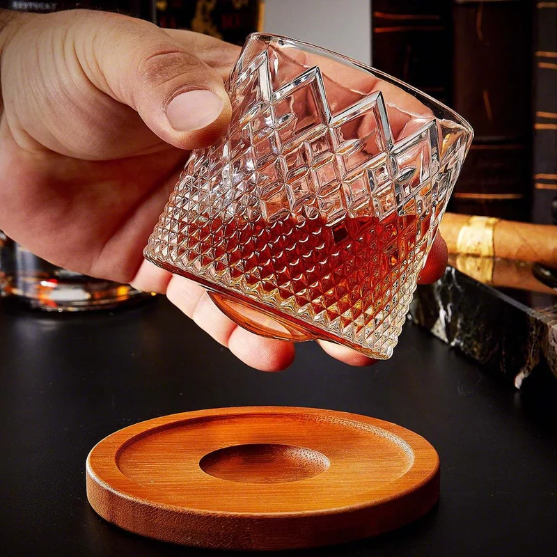 Spinning Whiskey Glass with Diamond Cut Pattern and Wooden Coaster Base