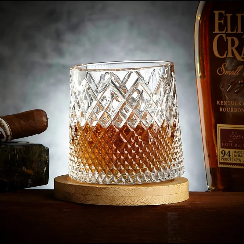 Spinning Whiskey Glass with Diamond Cut Pattern and Wooden Coaster Base