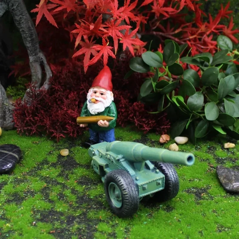 Halloween decoration, garden gnome with a military cannon, garden ornament, metal decorations