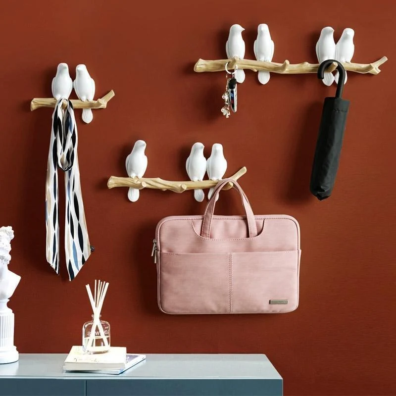 Wandhaak vogelmotief – Tak van hars met een tot vier zittende vogels