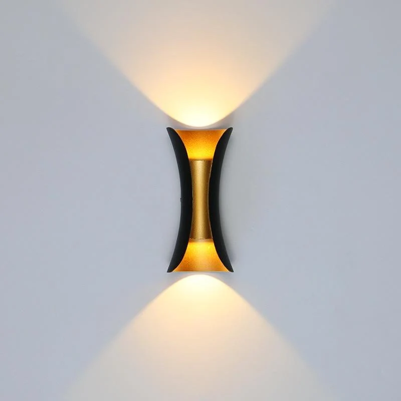 Modern outdoor LED wall light with curved design directing light up and down
