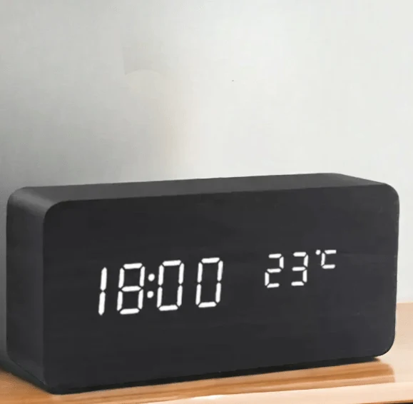 Clap-activated alarm clock with adjustable LED display