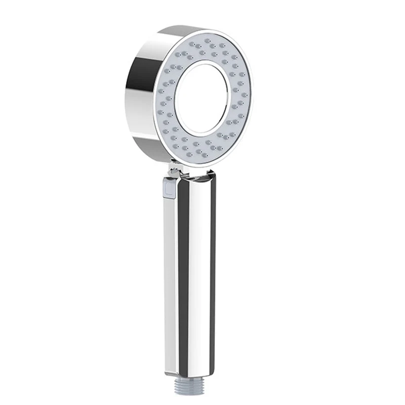 Adjustable handheld shower head with self-cleaning nozzles