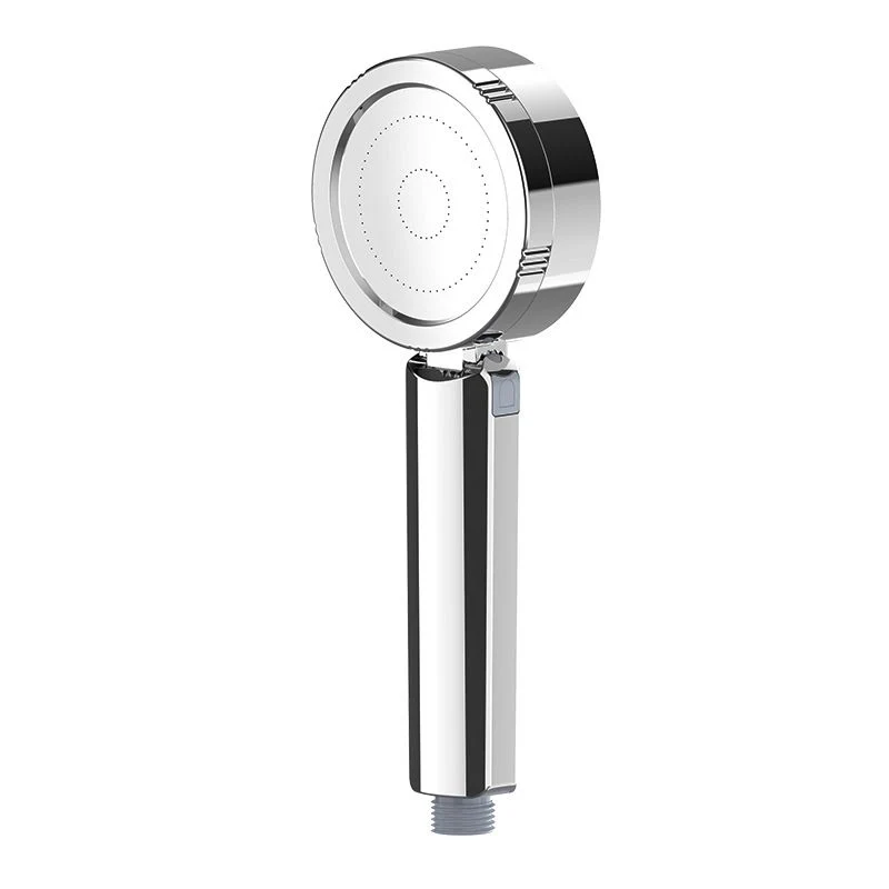 Adjustable handheld shower head with self-cleaning nozzles