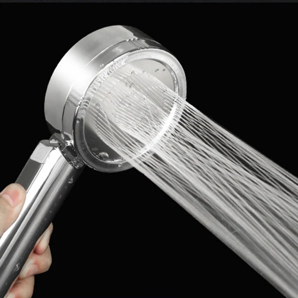 Adjustable handheld shower head with self-cleaning nozzles