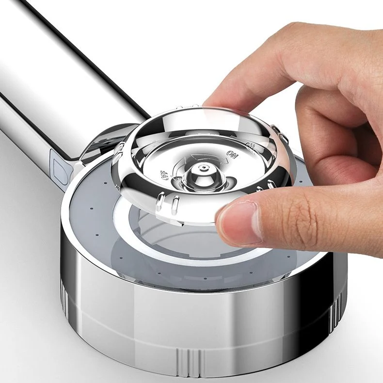 Adjustable handheld shower head with self-cleaning nozzles