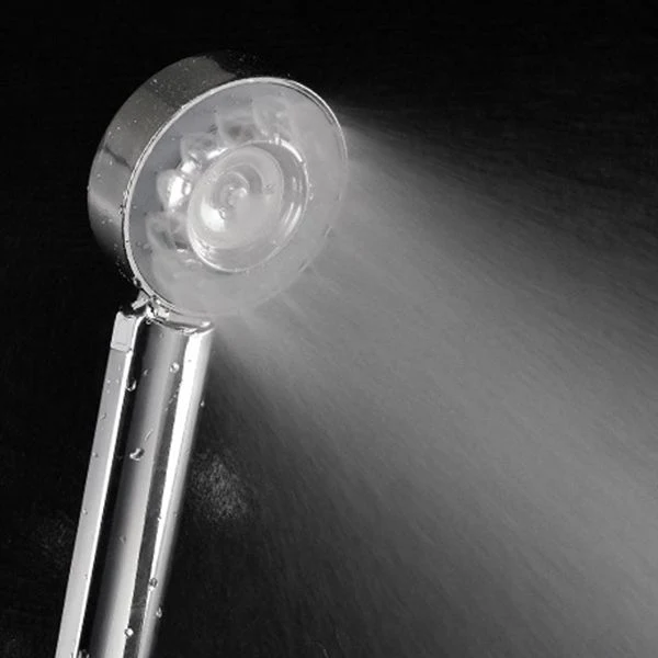 Adjustable handheld shower head with self-cleaning nozzles