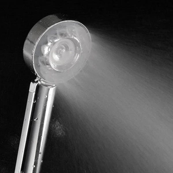 Adjustable handheld shower head with self-cleaning nozzles