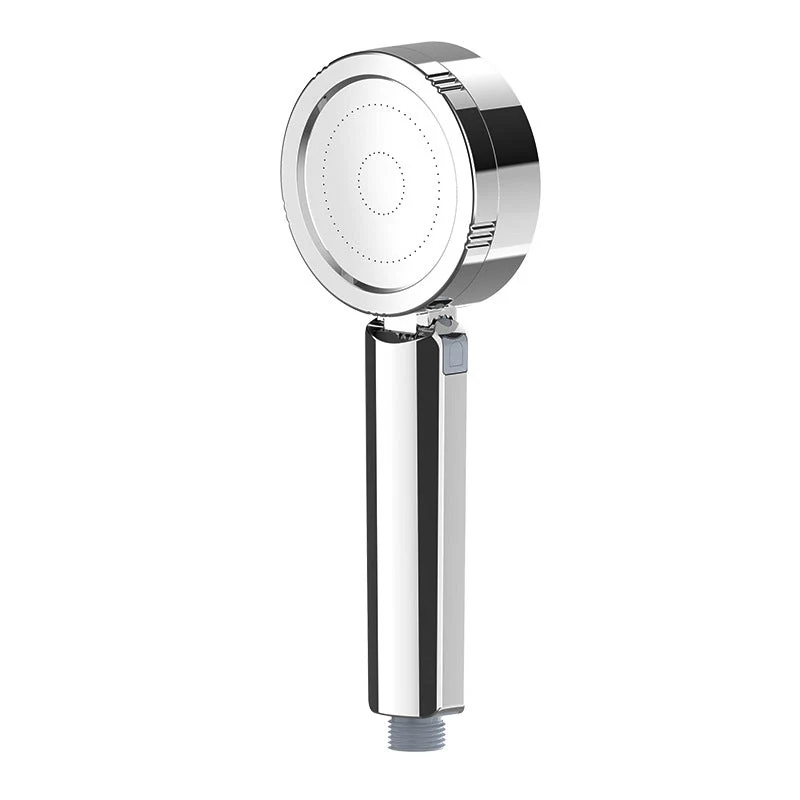 Adjustable handheld shower head with self-cleaning nozzles