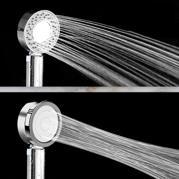 Adjustable handheld shower head with self-cleaning nozzles