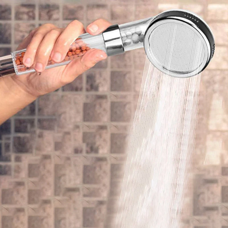 Round shower head with adjustable spray modes