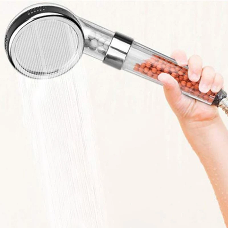 Round shower head with adjustable spray modes