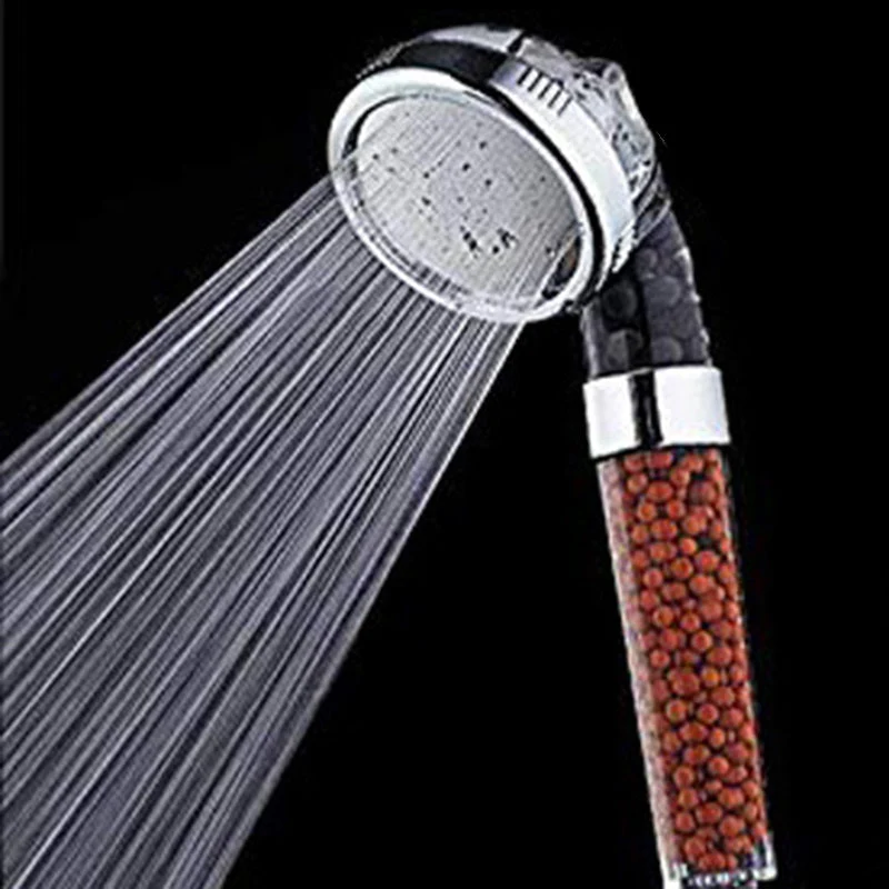 Round shower head with adjustable spray modes