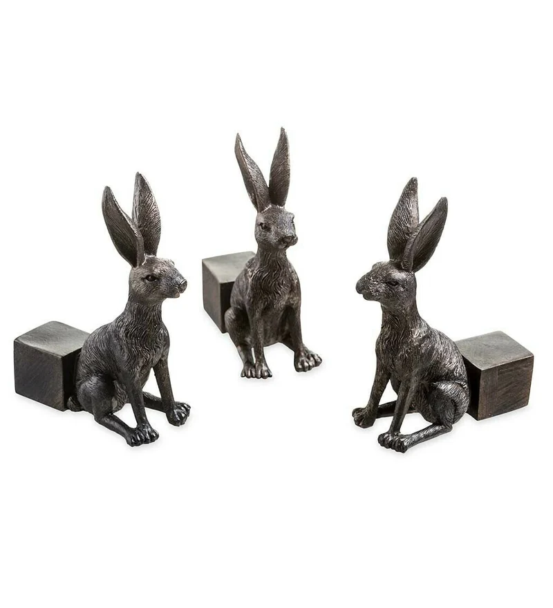 Set of garden pot supports shaped like animals
