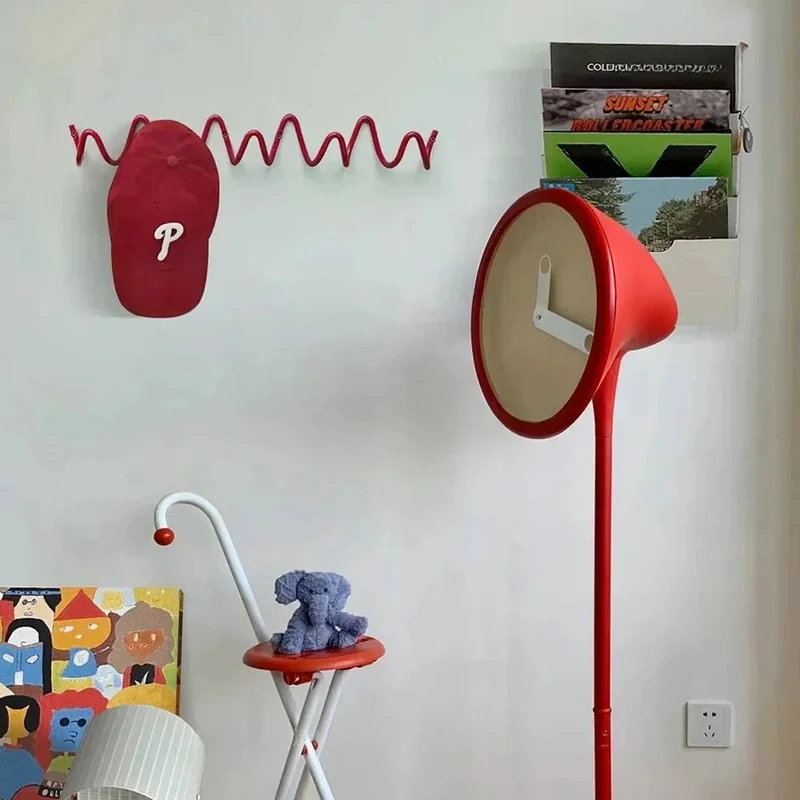Space-saving wall hanger with multiple hooks wave