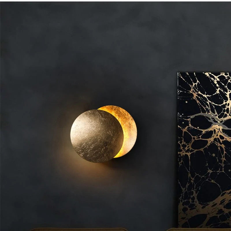 LED Eclipse wall sconce with warm light