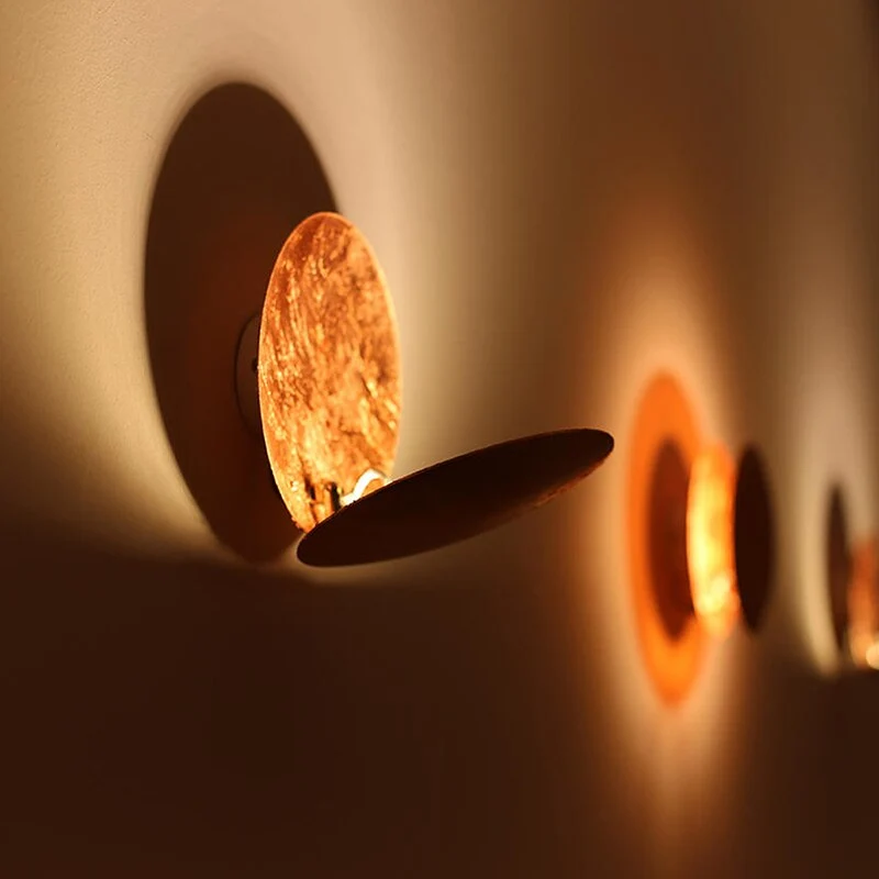 LED Eclipse wall sconce with warm light