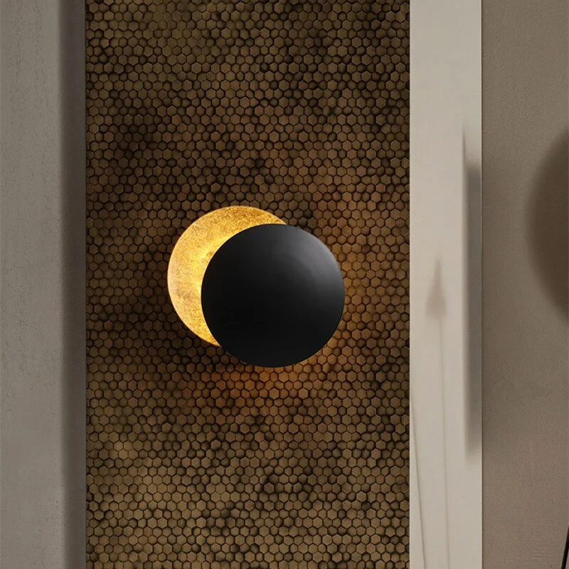 LED Eclipse wall sconce with warm light