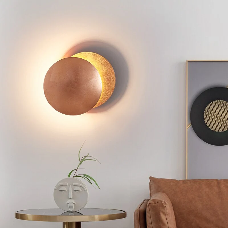 LED Eclipse wall sconce with warm light