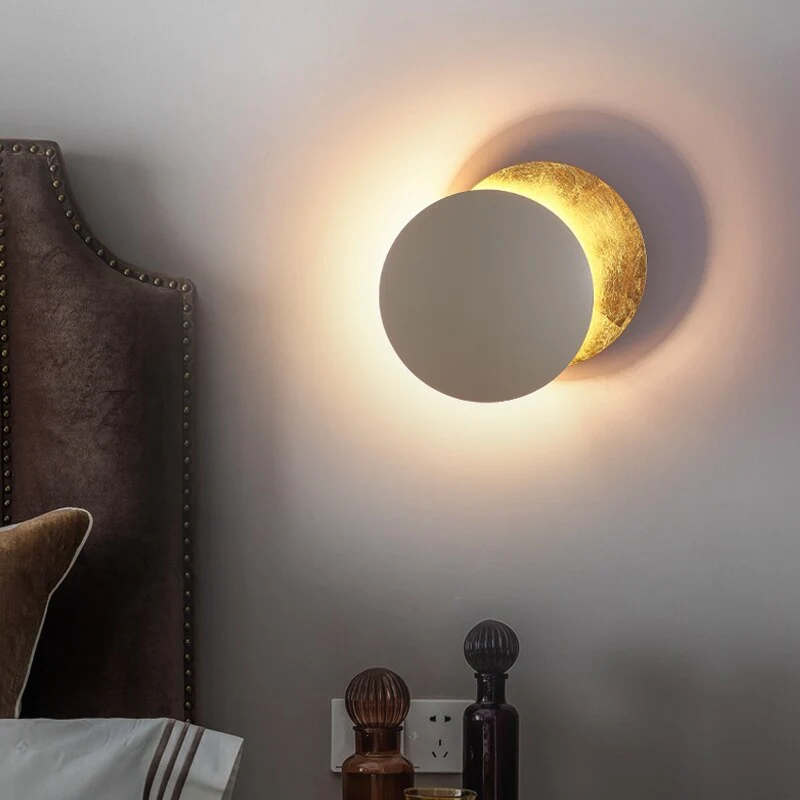 LED Eclipse wall sconce with warm light