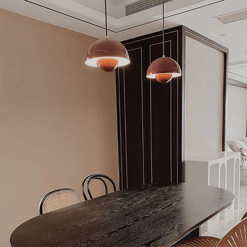 Modern pendant lamp with floating spherical glow