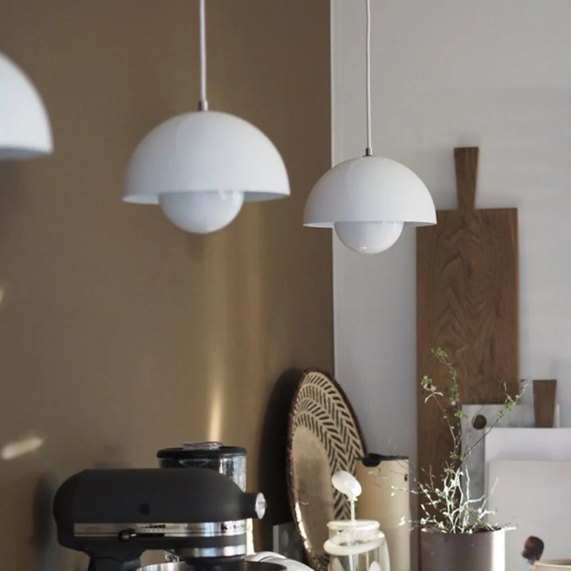 Modern pendant lamp with floating spherical glow