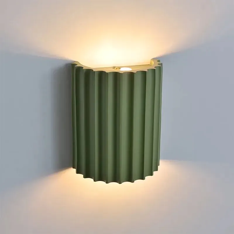 Elegant round wall lamp in soft colors