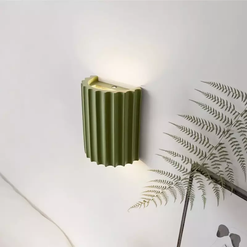 Elegant round wall lamp in soft colors