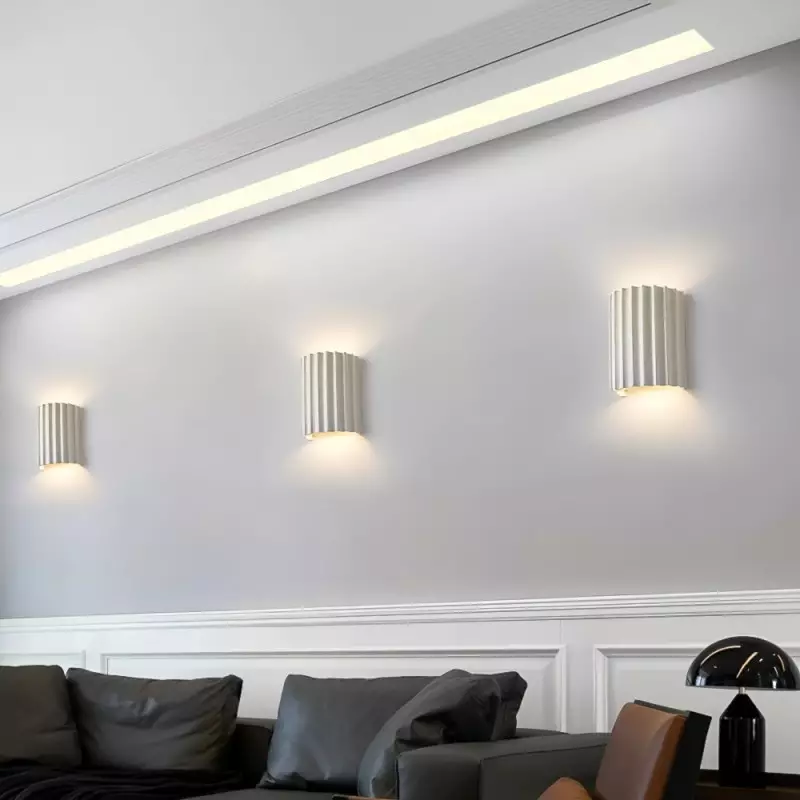 Elegant round wall lamp in soft colors