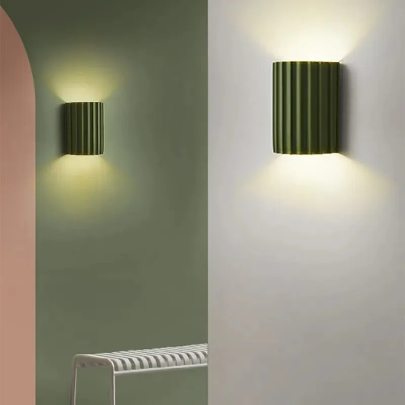 Elegant round wall lamp in soft colors