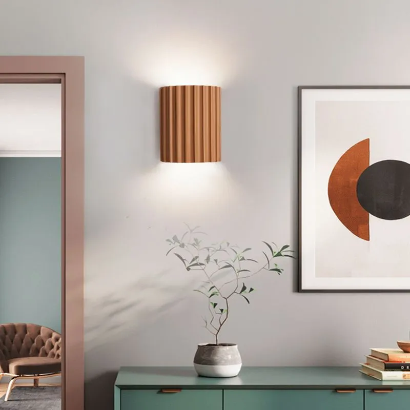 Elegant round wall lamp in soft colors