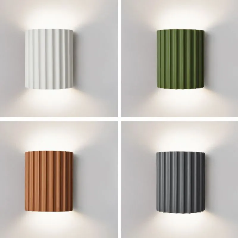 Elegant round wall lamp in soft colors