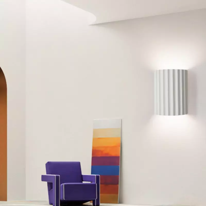 Elegant round wall lamp in soft colors
