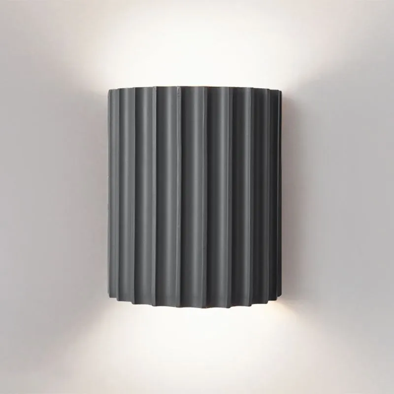 Elegant round wall lamp in soft colors