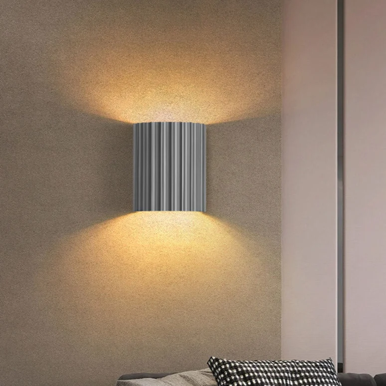 Elegant round wall lamp in soft colors