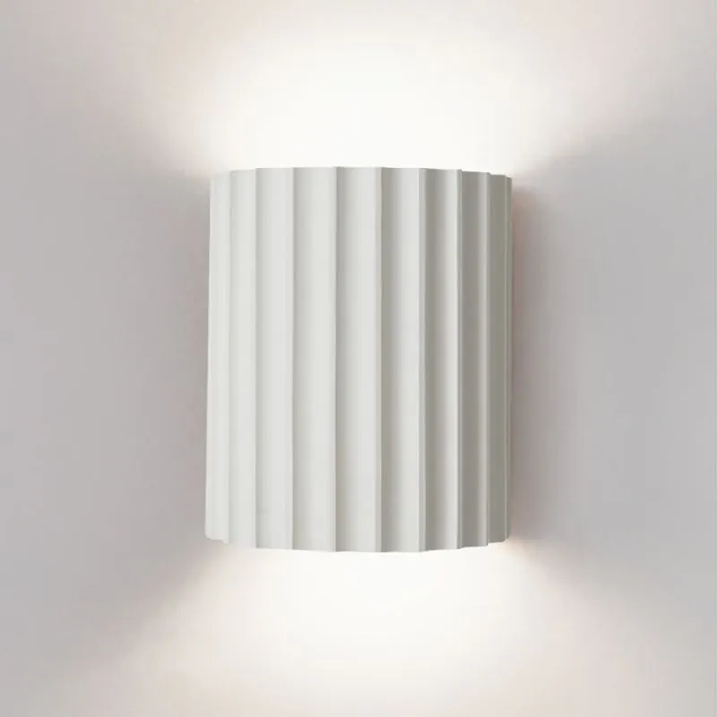 Elegant round wall lamp in soft colors