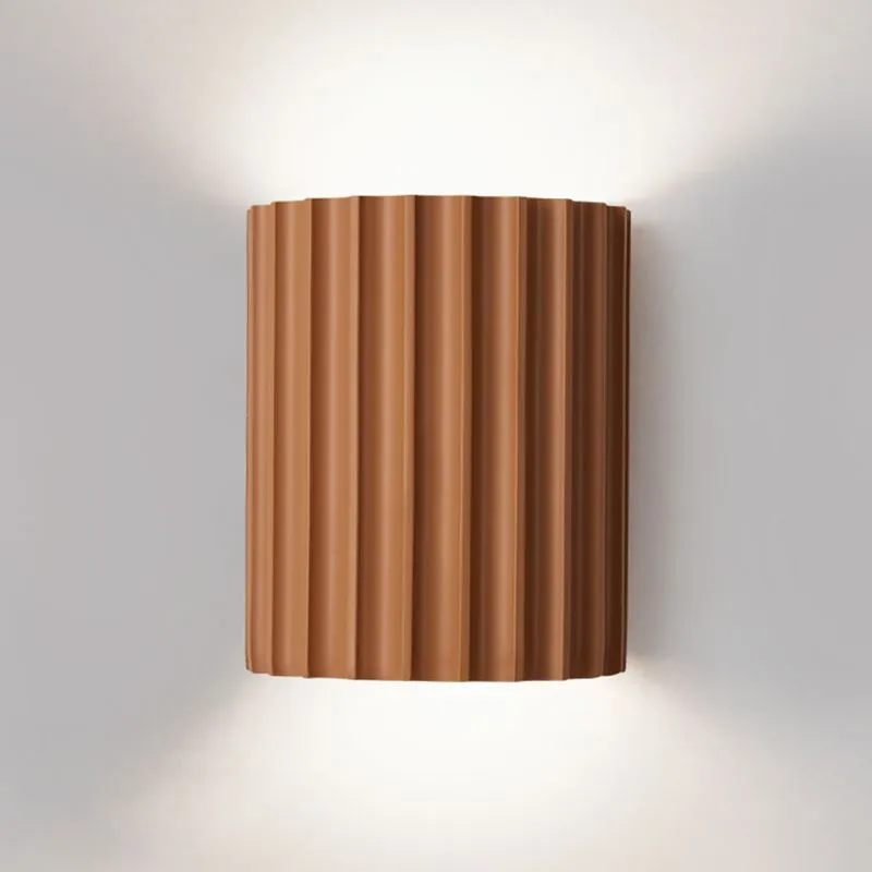 Elegant round wall lamp in soft colors