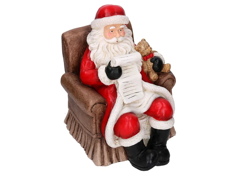 Babbo Natale in resina su poltrona rosso 27xh.35cm