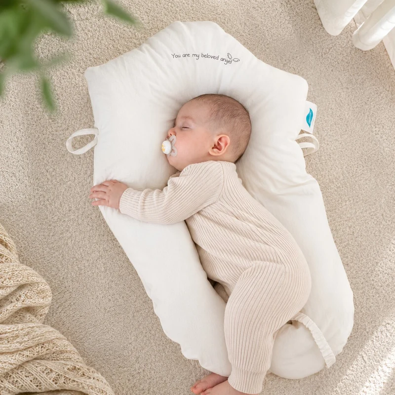 Babykopfkissen mit Seitenstütze | WiegenKontur