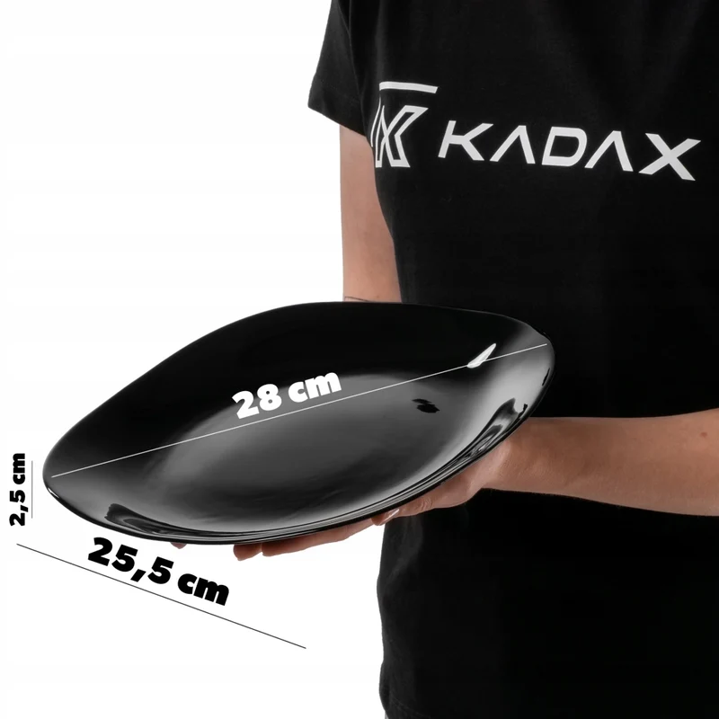 Set di 3 piatti piani KADAX da 28 cm, colore nero.