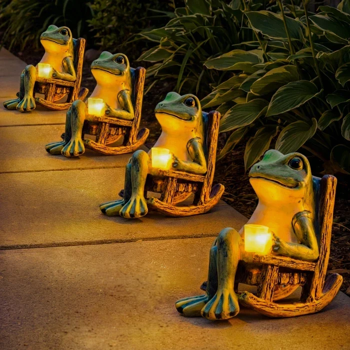Tuinbeeld kikker met lichtgevende beker – decoratie die 's avonds zacht gloeit