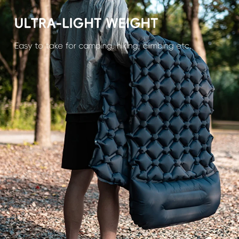 Inflatable camping sleeping mat with built-in pillow