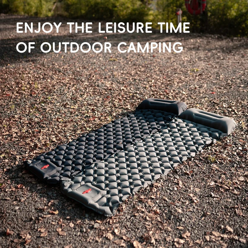 Inflatable camping sleeping mat with built-in pillow