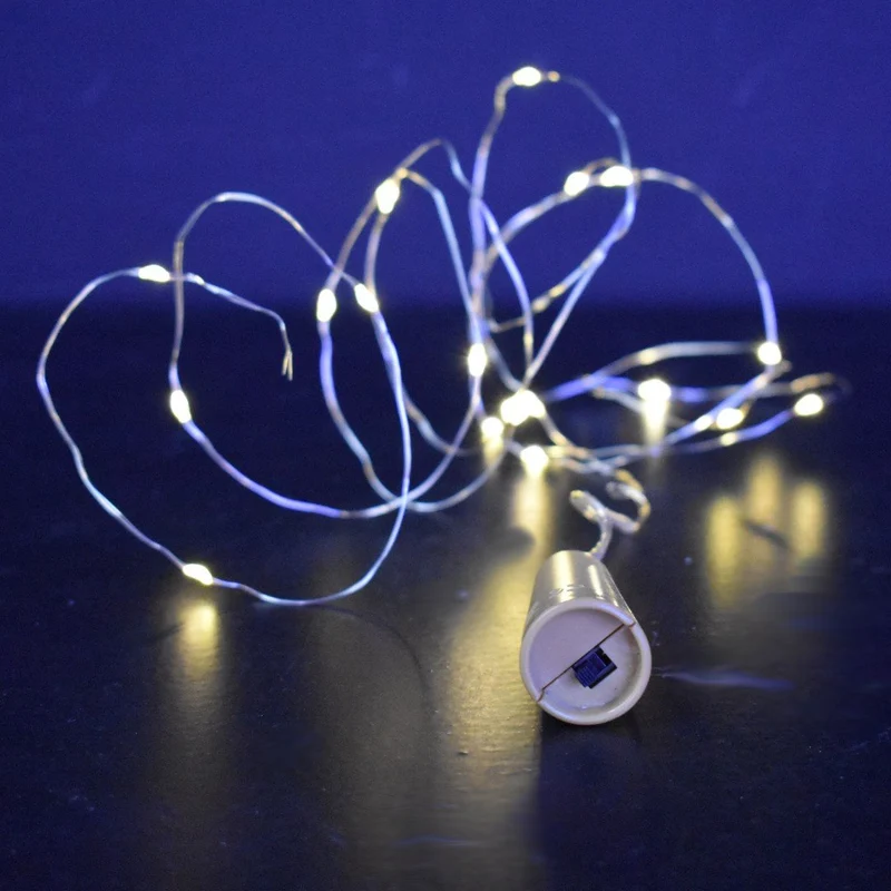 TAPPO DECORATIVO CON FILO LUCI