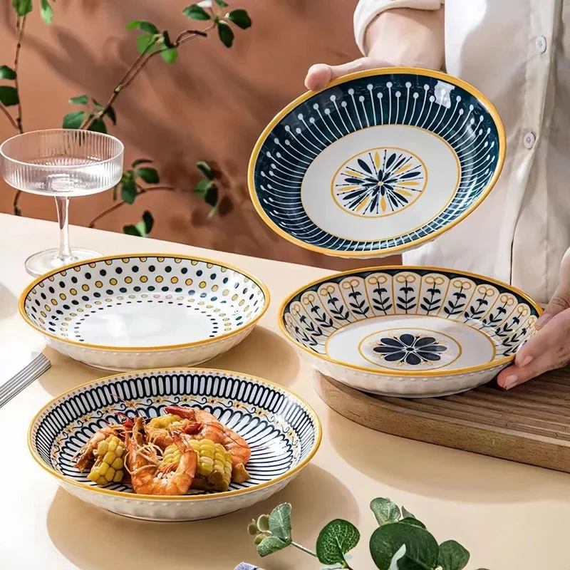 Bordenset – 4-delige porseleinen set met decoratief patroon en gouden rand