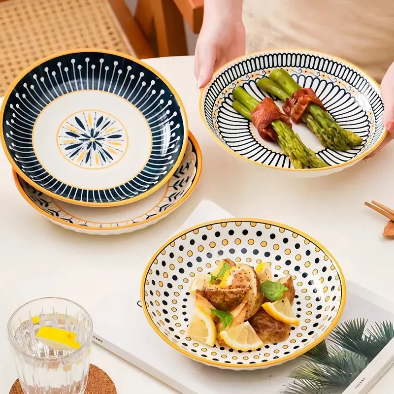 Bordenset – 4-delige porseleinen set met decoratief patroon en gouden rand