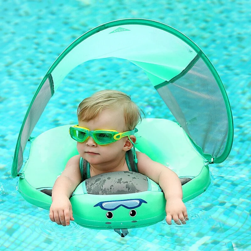 Infant Swimmer with Swimming Trainer Learning Aid