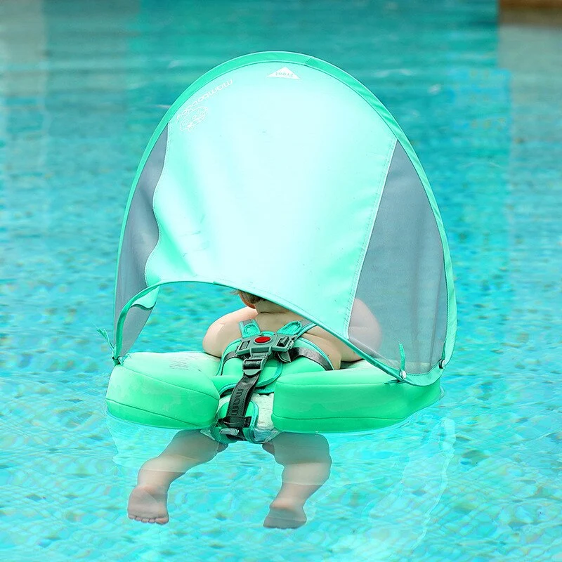Infant Swimmer with Swimming Trainer Learning Aid