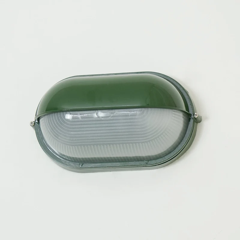 Outdoor industrial bulkhead wall lamp Oval weather-resistant design